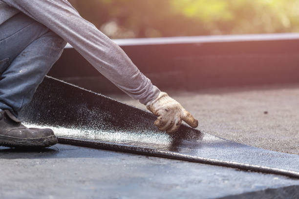 Professional Basement Waterproofing technician working in Holton, IN